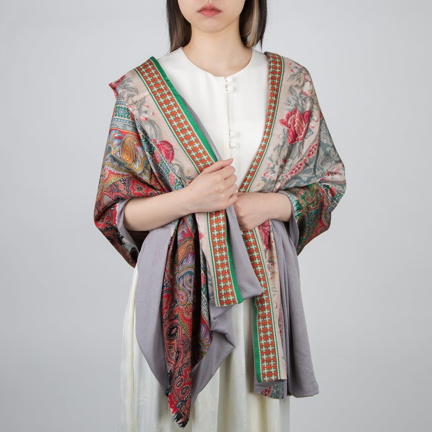 girl wearing a pierre louis mascia multi-colored floral and paisley wool blanket
