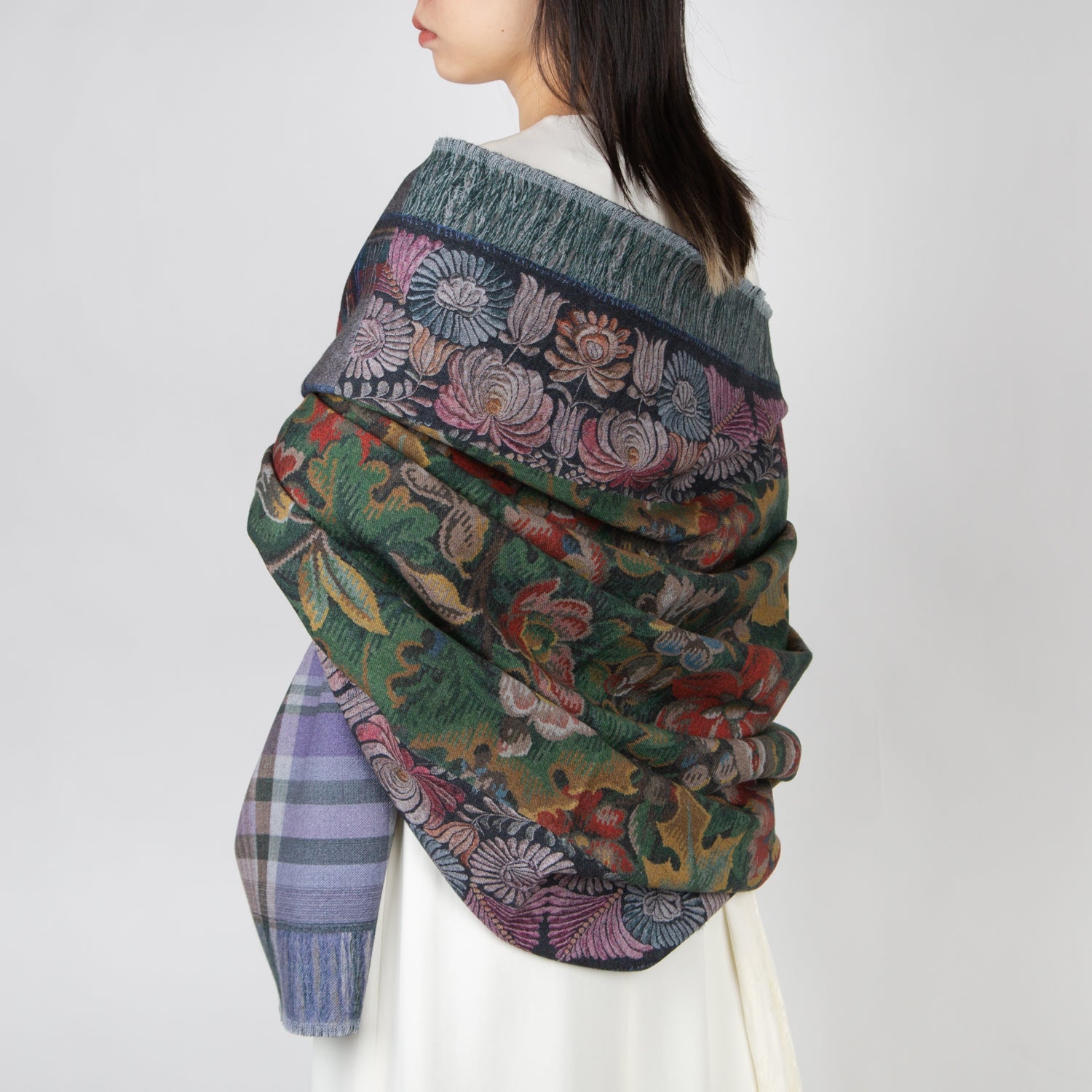 girl wearing a pierre louis mascia multi colored floral plaid and geometric print wool blanket