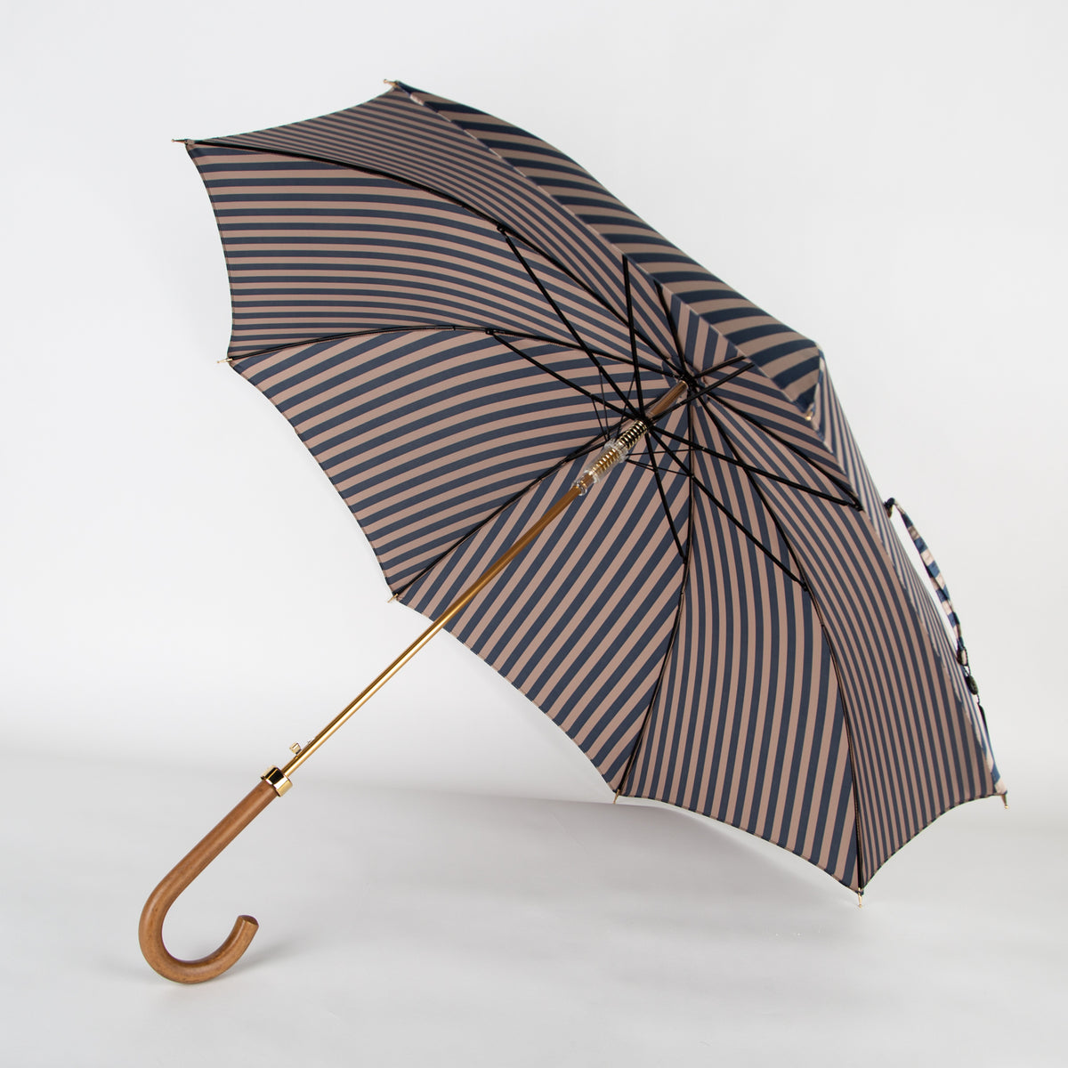 striped blue umbrella with malacca wood handle