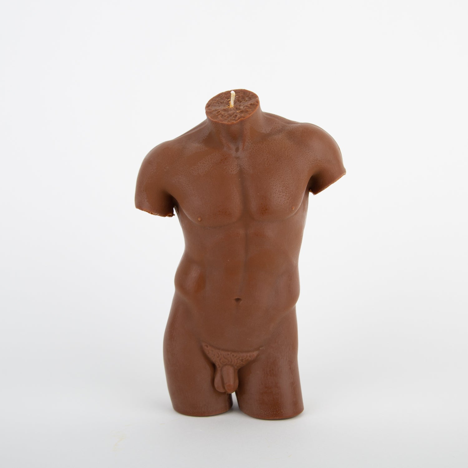 male form soy and bees wax candle in terracotta at Secret Location Concept Store