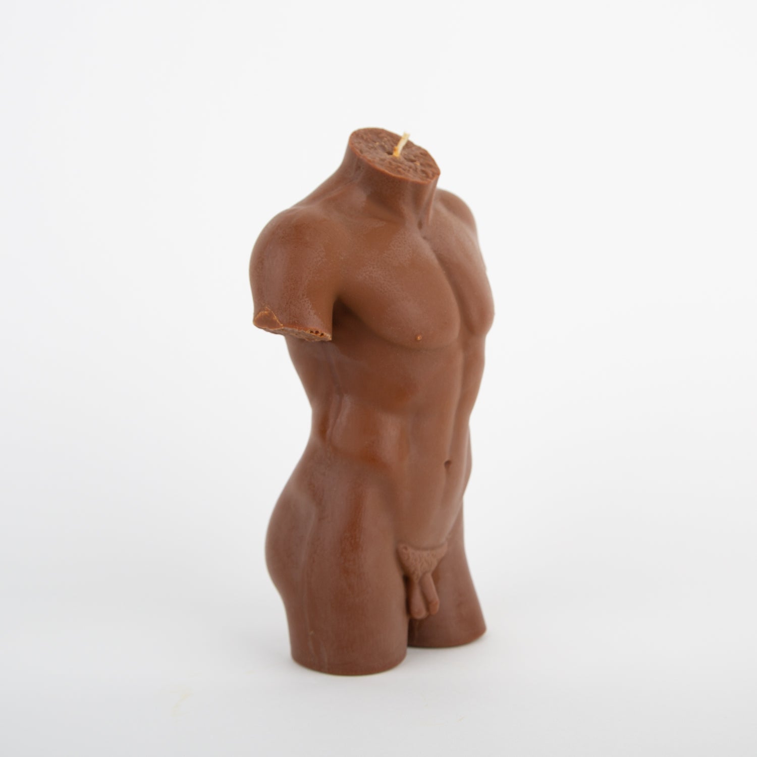 male form soy and bees wax candle in terracotta at Secret Location Concept Store
